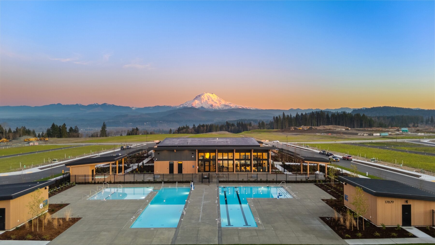 Aerial Mt Rainier with pools at sunset
